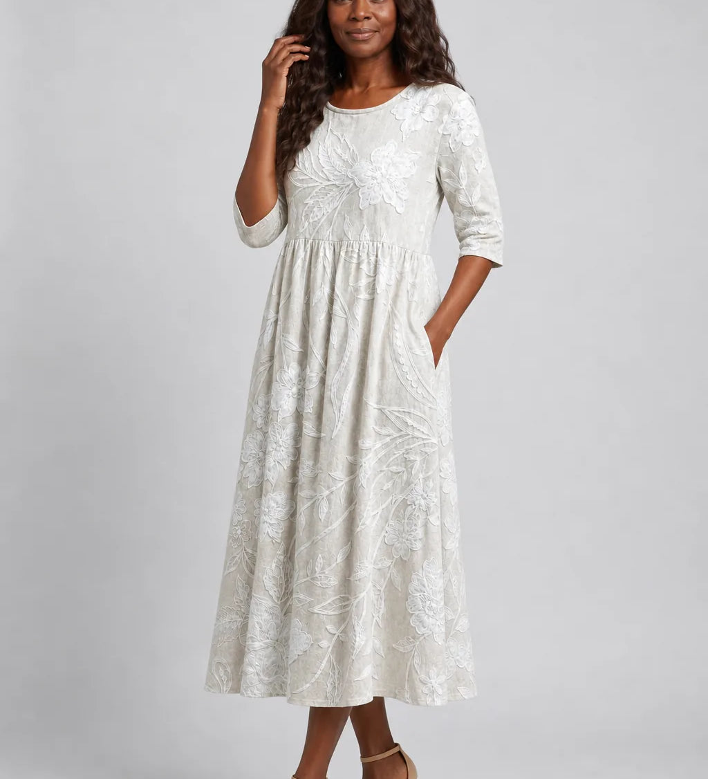Amina | Elegantti puutarhamidimekko taskuilla