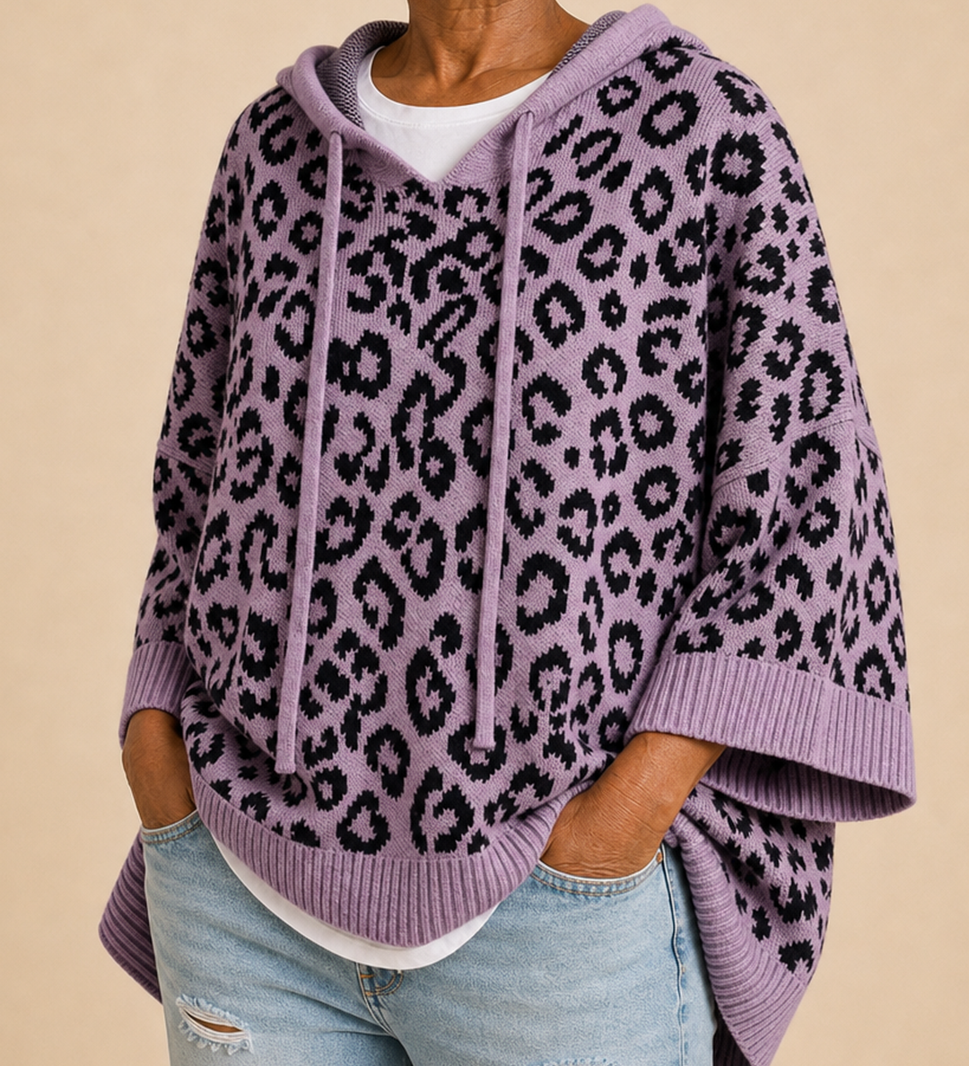 Emilia | Eläinkuvioinen neulottu hupullinen poncho