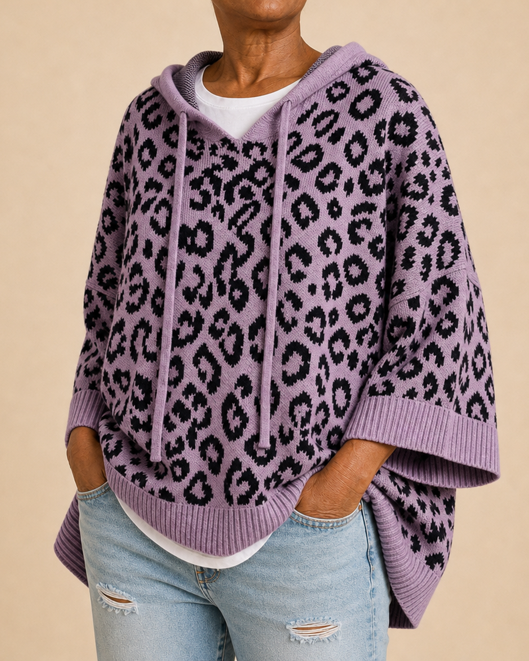 Emilia | Eläinkuvioinen neulottu hupullinen poncho