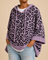 Emilia | Eläinkuvioinen neulottu hupullinen poncho