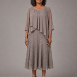 Lace | Morsiamen äidin sifonkimekko pitsikerroksella
