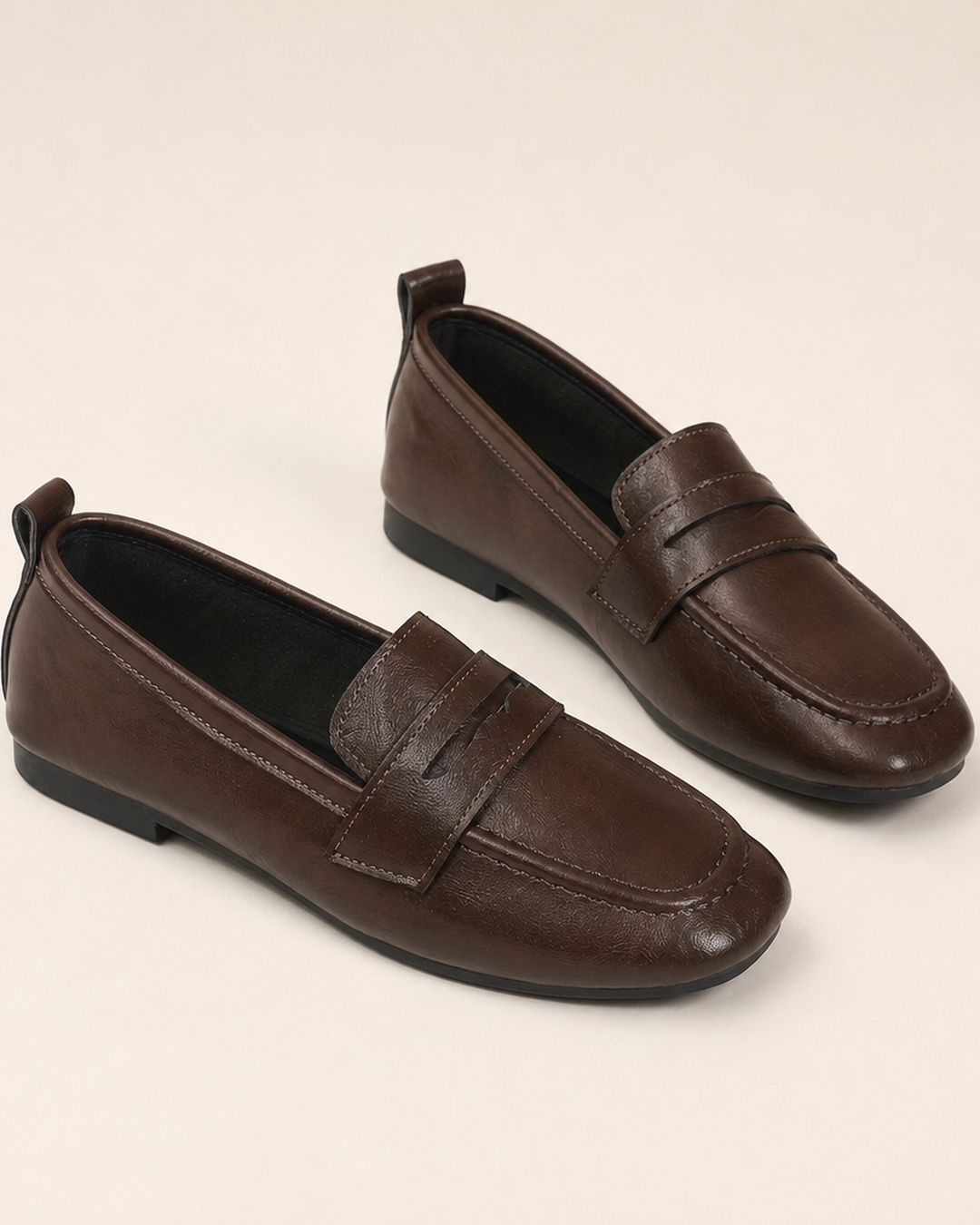 Erma | Kanttikärkiset penny-loaferit