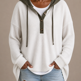 Irma | Neulottu hupullinen poncho napeilla