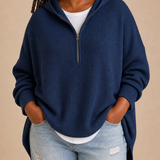 Goldie | Neulottu hupullinen poncho vetoketjulla
